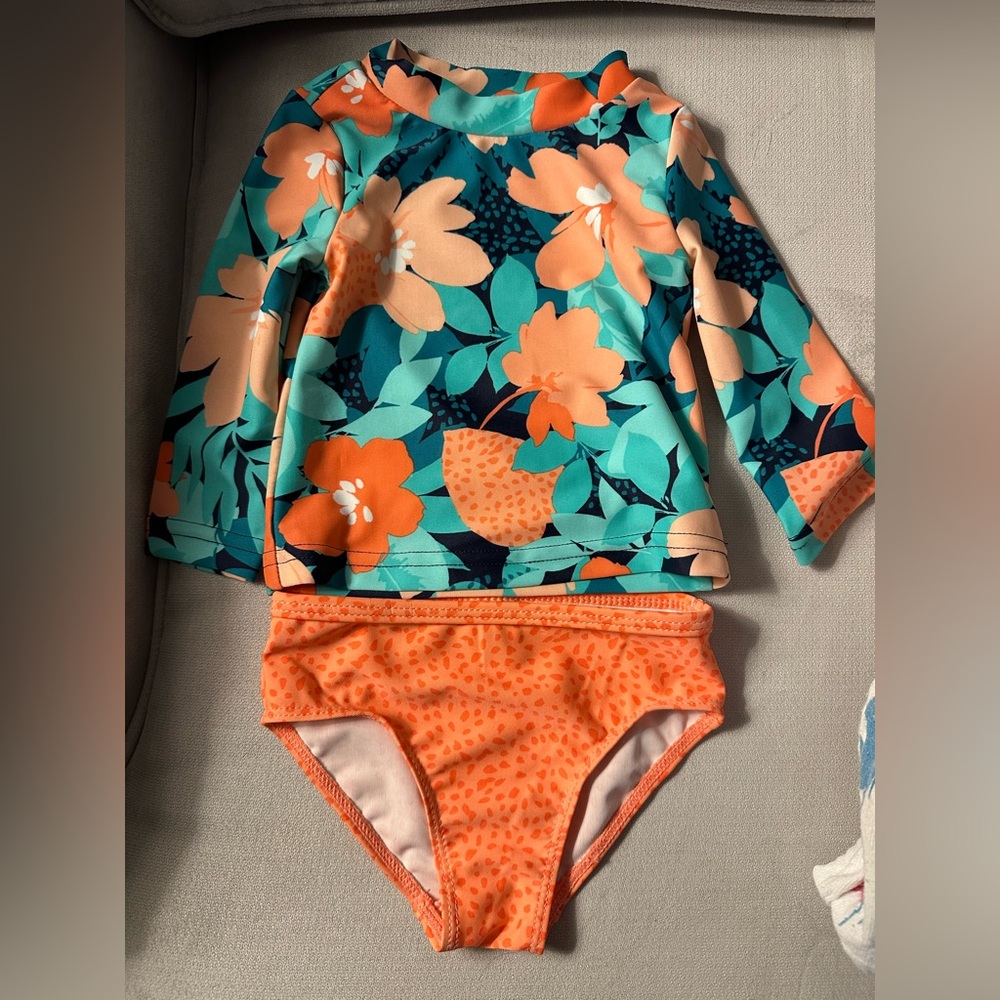 NWOT never-worn Carters two-piece baby swimsuit